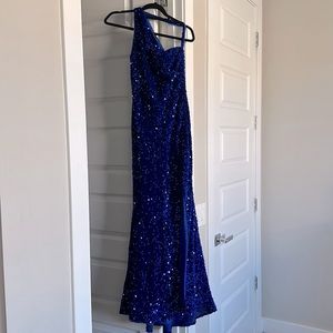 Sequins prom dress. Zip in back. Worn once. Great quality. Body con